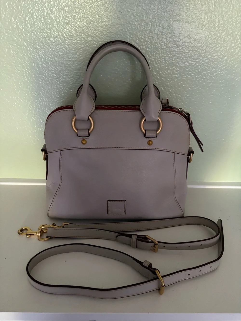 Dooney & Bourke bone color  Leather Satchel with Gold Hardware